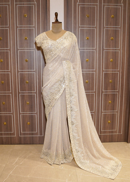 Ivory Sequence Saree with Hand Embroidered Border and Stitched Blouse