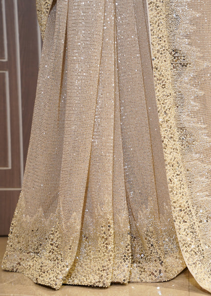 Ivory Sequence Saree with Hand Embroidered Border and Stitched Blouse