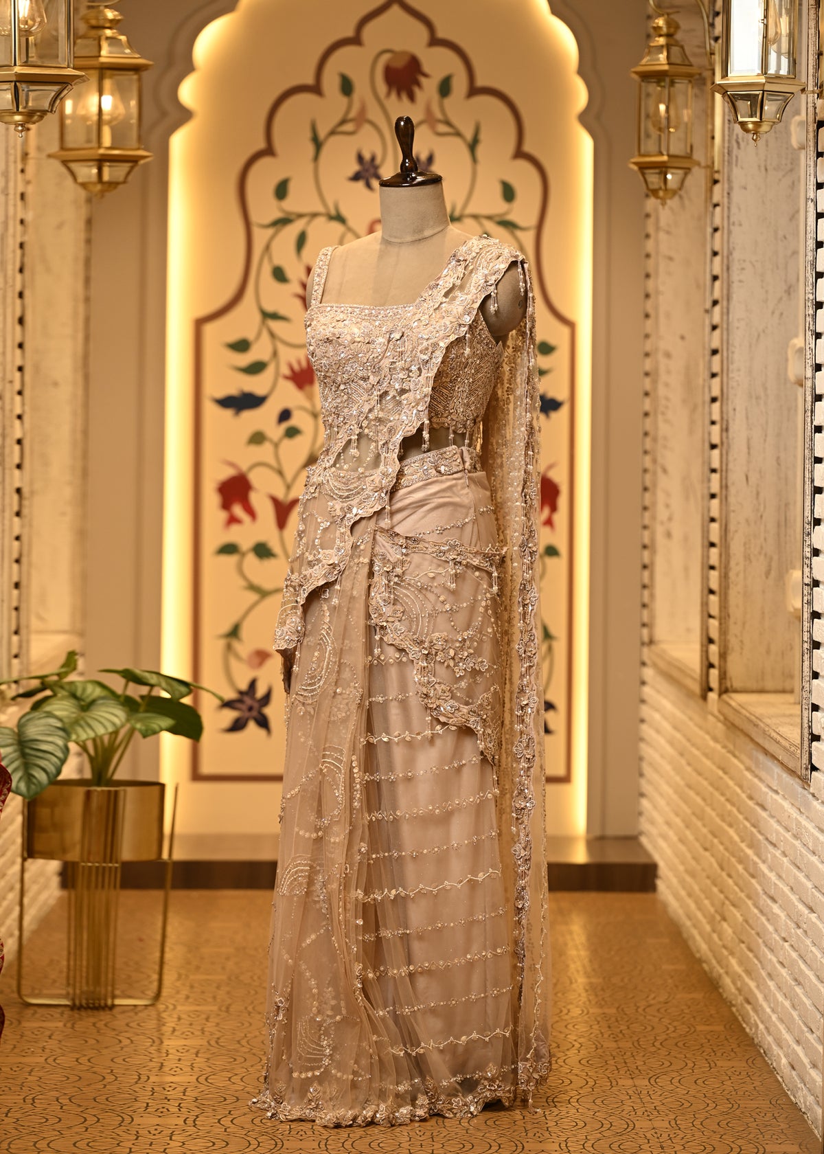 Shanaya Champagne Beige Embellished Pre Draped Saree Set