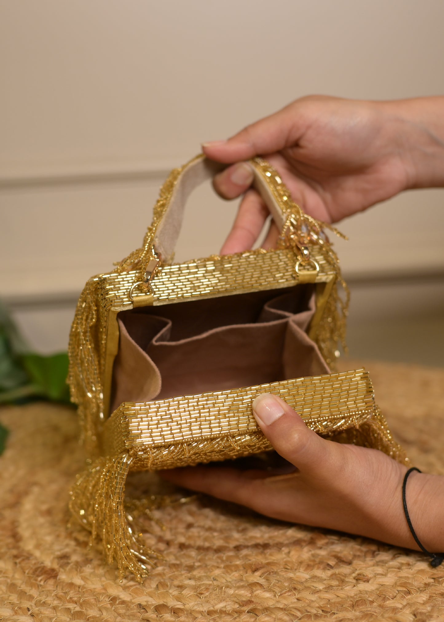 Golden Side Fringe Clutch