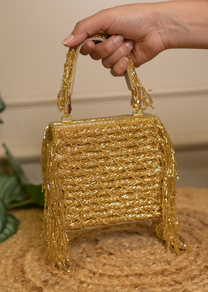 Golden Side Fringe Clutch